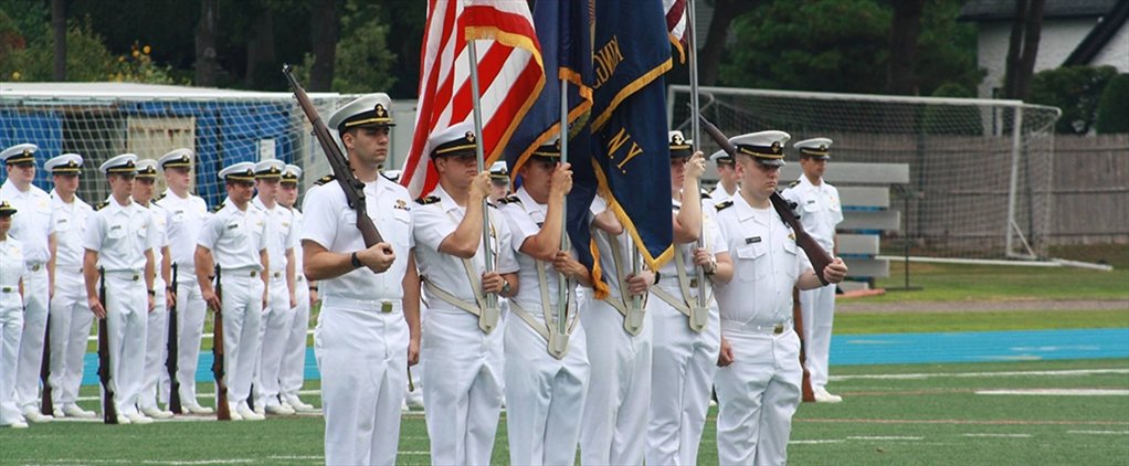 The color guard holding flags