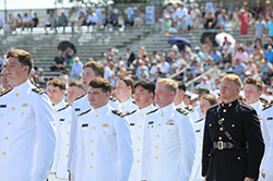Soldiers standing in a field. Links to Gifts of Appreciated Securities